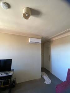 Daikin split system air conditioner installed in a living room