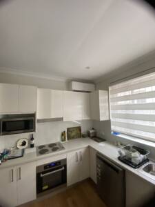 Split system ac unit installed in a kitchen at Rose Bay area.