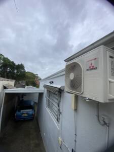 Split system outdoor unit installed on a sideway at Rose Bay