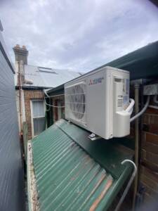 Outdoor ac unit installed on a sideway