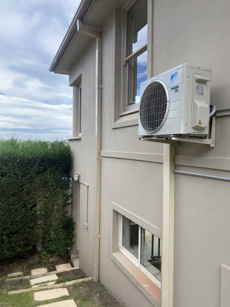 Outdoor ac unit on wall brackets at Bondi