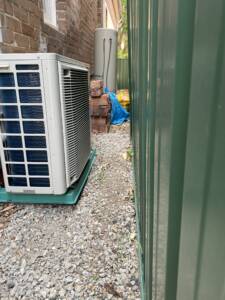 Daikin compressor unit installed on a sideway at Bondi
