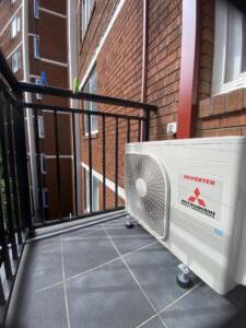 Mitsubishi outdoor unit installed in on a balcony at Bondi